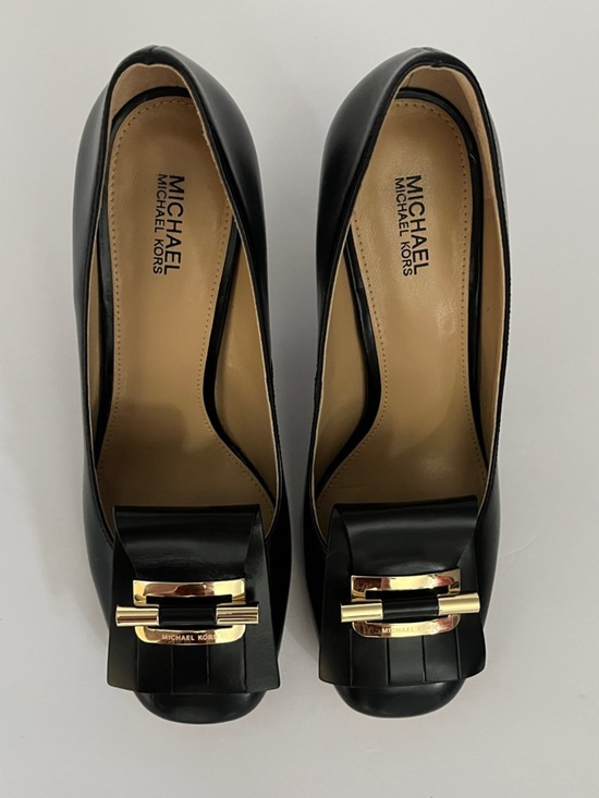 Michael Kors Shoes - Michael Kors Gloria Kiltie Fringe Leather Pumps in Black with Gold-Tone Buckle